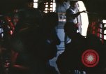 Image of U.S. and Montagnard troops parachute from CH-3E helicopter Vietnam, 1967, second 17 stock footage video 65675075610