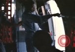 Image of U.S. and Montagnard troops parachute from CH-3E helicopter Vietnam, 1967, second 23 stock footage video 65675075610