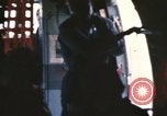 Image of U.S. and Montagnard troops parachute from CH-3E helicopter Vietnam, 1967, second 26 stock footage video 65675075610