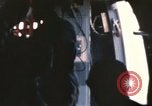 Image of U.S. and Montagnard troops parachute from CH-3E helicopter Vietnam, 1967, second 29 stock footage video 65675075610