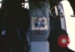 Image of U.S. and Montagnard troops parachute from CH-3E helicopter Vietnam, 1967, second 30 stock footage video 65675075610