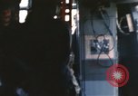 Image of U.S. and Montagnard troops parachute from CH-3E helicopter Vietnam, 1967, second 31 stock footage video 65675075610