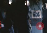 Image of U.S. and Montagnard troops parachute from CH-3E helicopter Vietnam, 1967, second 32 stock footage video 65675075610