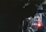 Image of U.S. and Montagnard troops parachute from CH-3E helicopter Vietnam, 1967, second 43 stock footage video 65675075610