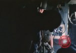 Image of U.S. and Montagnard troops parachute from CH-3E helicopter Vietnam, 1967, second 44 stock footage video 65675075610