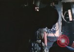 Image of U.S. and Montagnard troops parachute from CH-3E helicopter Vietnam, 1967, second 45 stock footage video 65675075610