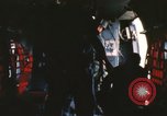 Image of U.S. and Montagnard troops parachute from CH-3E helicopter Vietnam, 1967, second 52 stock footage video 65675075610