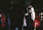 Image of U.S. and Montagnard troops parachute from CH-3E helicopter Vietnam, 1967, second 55 stock footage video 65675075610