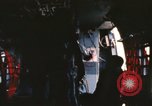 Image of U.S. and Montagnard troops parachute from CH-3E helicopter Vietnam, 1967, second 56 stock footage video 65675075610