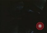 Image of U.S. and Montagnard troops parachute from CH-3E helicopter Vietnam, 1967, second 57 stock footage video 65675075610