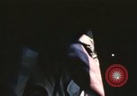 Image of U.S. and Montagnard troops parachute from CH-3E helicopter Vietnam, 1967, second 61 stock footage video 65675075610