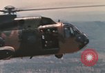 Image of 20th Helicopter Squadron paratroopers Vietnam, 1962, second 51 stock footage video 65675075612