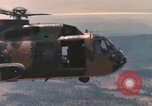 Image of 20th Helicopter Squadron paratroopers Vietnam, 1962, second 58 stock footage video 65675075612