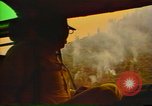 Image of Flames rising above tall trees California United States USA, 1987, second 32 stock footage video 65675075621