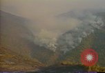 Image of Flames rising above tall trees California United States USA, 1987, second 35 stock footage video 65675075621