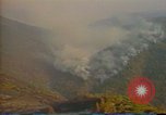 Image of Flames rising above tall trees California United States USA, 1987, second 38 stock footage video 65675075621