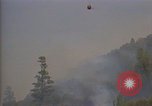 Image of aircraft fighting fires California United States USA, 1987, second 8 stock footage video 65675075623