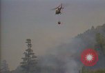 Image of aircraft fighting fires California United States USA, 1987, second 9 stock footage video 65675075623