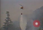 Image of aircraft fighting fires California United States USA, 1987, second 11 stock footage video 65675075623