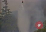 Image of aircraft fighting fires California United States USA, 1987, second 12 stock footage video 65675075623