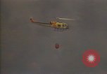 Image of aircraft fighting fires California United States USA, 1987, second 14 stock footage video 65675075623