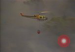 Image of aircraft fighting fires California United States USA, 1987, second 16 stock footage video 65675075623