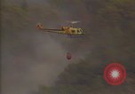 Image of aircraft fighting fires California United States USA, 1987, second 17 stock footage video 65675075623