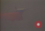 Image of aircraft fighting fires California United States USA, 1987, second 44 stock footage video 65675075623