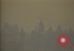 Image of aircraft fighting fires California United States USA, 1987, second 58 stock footage video 65675075623