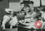 Image of African American teacher New Orleans Louisiana USA, 1937, second 61 stock footage video 65675075659