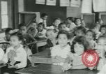 Image of African American children New Orleans Louisiana USA, 1937, second 4 stock footage video 65675075660