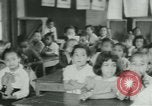 Image of African American children New Orleans Louisiana USA, 1937, second 5 stock footage video 65675075660