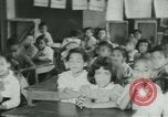 Image of African American children New Orleans Louisiana USA, 1937, second 6 stock footage video 65675075660