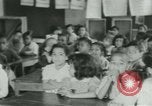 Image of African American children New Orleans Louisiana USA, 1937, second 7 stock footage video 65675075660