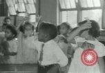 Image of African American children New Orleans Louisiana USA, 1937, second 10 stock footage video 65675075660