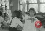 Image of African American children New Orleans Louisiana USA, 1937, second 12 stock footage video 65675075660