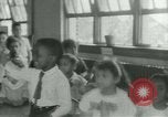 Image of African American children New Orleans Louisiana USA, 1937, second 14 stock footage video 65675075660