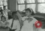 Image of African American children New Orleans Louisiana USA, 1937, second 15 stock footage video 65675075660