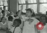 Image of African American children New Orleans Louisiana USA, 1937, second 16 stock footage video 65675075660