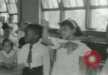Image of African American children New Orleans Louisiana USA, 1937, second 18 stock footage video 65675075660