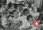 Image of African American children New Orleans Louisiana USA, 1937, second 28 stock footage video 65675075660