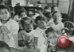 Image of African American children New Orleans Louisiana USA, 1937, second 32 stock footage video 65675075660