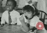 Image of African American children New Orleans Louisiana USA, 1937, second 38 stock footage video 65675075660
