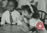 Image of African American children New Orleans Louisiana USA, 1937, second 39 stock footage video 65675075660