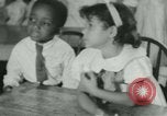 Image of African American children New Orleans Louisiana USA, 1937, second 40 stock footage video 65675075660