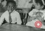 Image of African American children New Orleans Louisiana USA, 1937, second 42 stock footage video 65675075660
