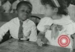 Image of African American children New Orleans Louisiana USA, 1937, second 44 stock footage video 65675075660