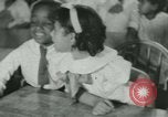Image of African American children New Orleans Louisiana USA, 1937, second 46 stock footage video 65675075660