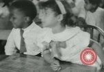 Image of African American children New Orleans Louisiana USA, 1937, second 49 stock footage video 65675075660