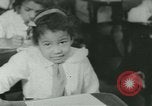 Image of African American children New Orleans Louisiana USA, 1937, second 56 stock footage video 65675075660